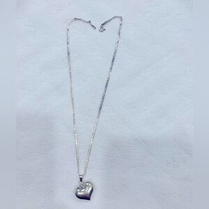 Silver Necklaces and earrings.